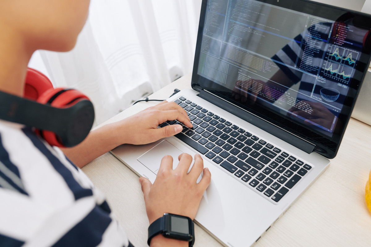 Student Learning coding on a computer